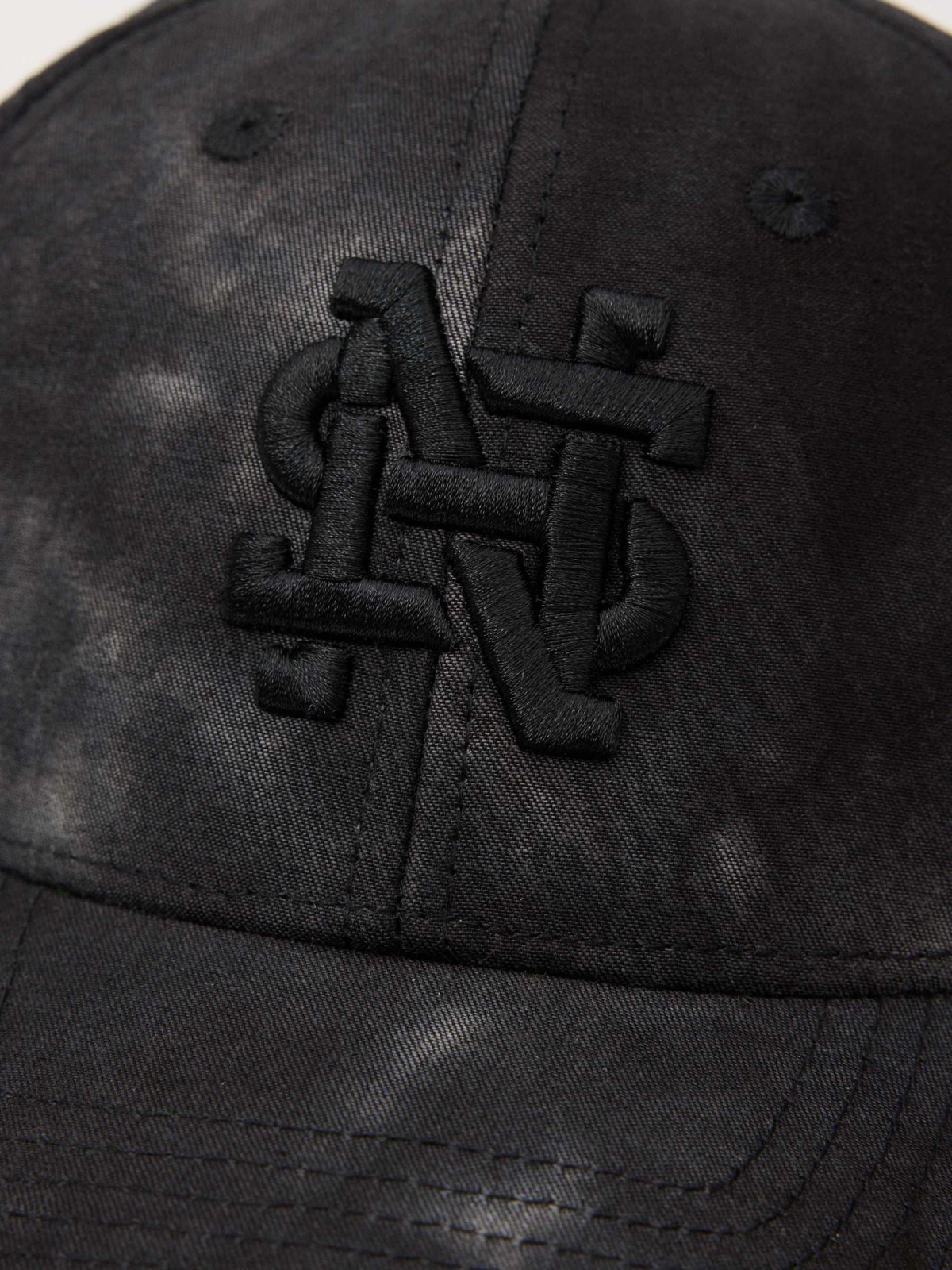 Baseball cap logo black detail view