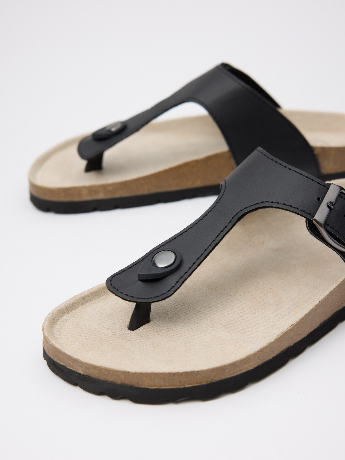 Black sandal with buckle black detail view