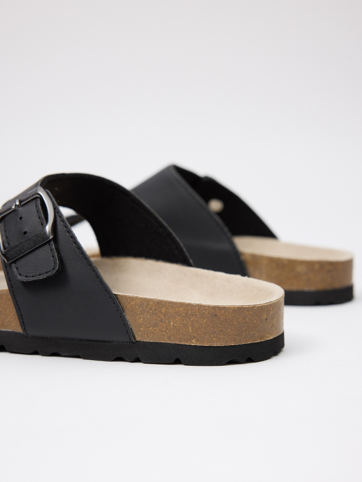 Black sandal with buckle black detail view