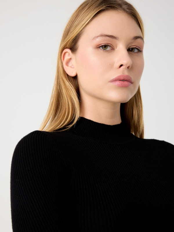 Black sweater with turtleneck black detail view