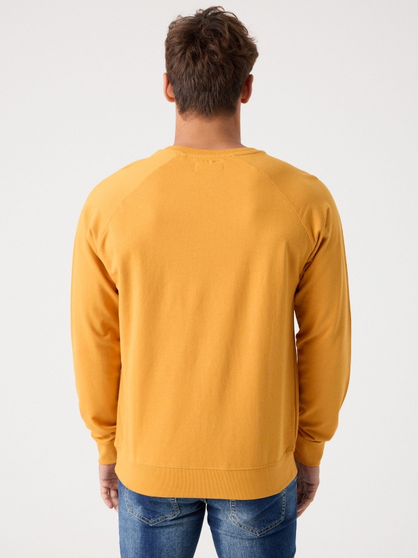 Basic sweatshirt with text ochre middle back view