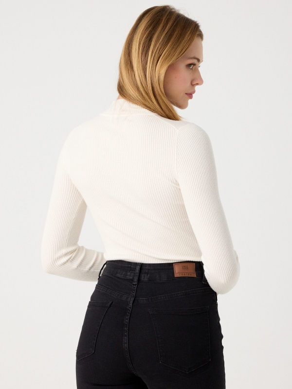 Black sweater with turtleneck off white middle back view