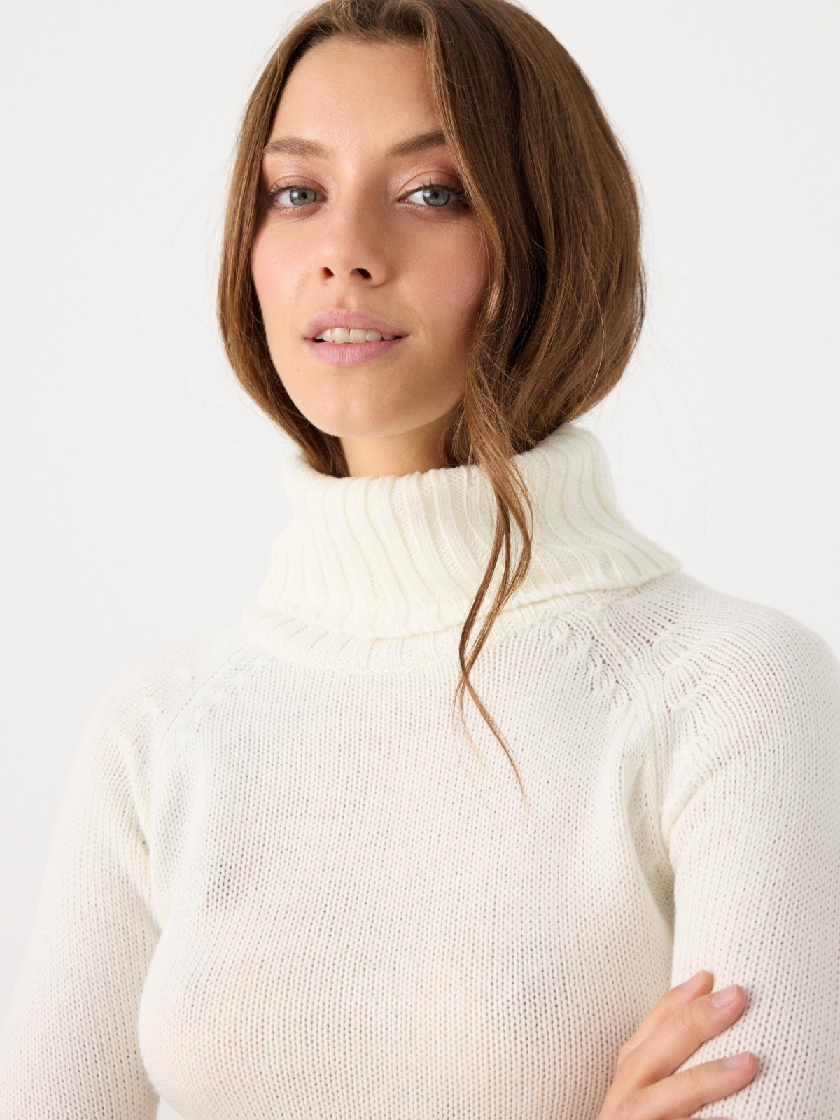 knit turtleneck sweater off white foreground