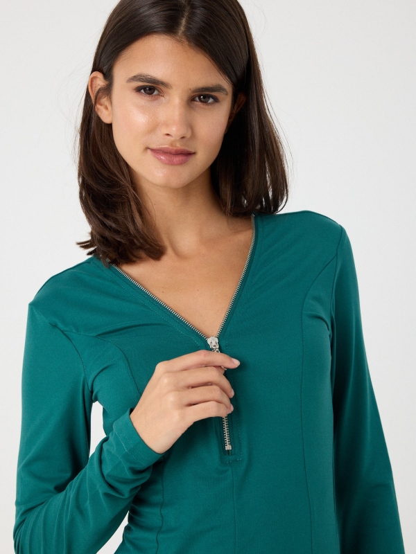 Mini dress with zipper neckline green detail view