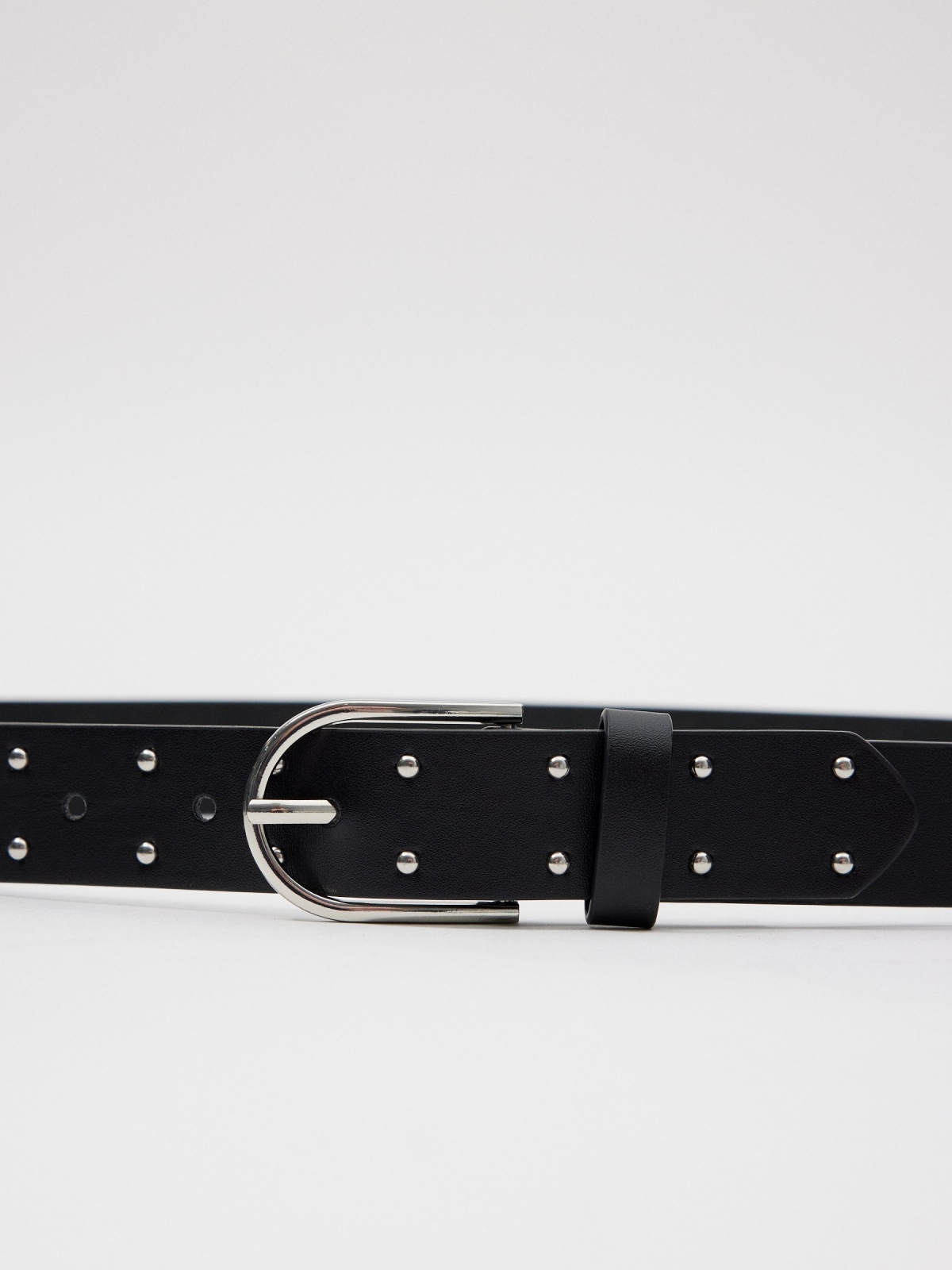 Buckle and studded belt black detail view