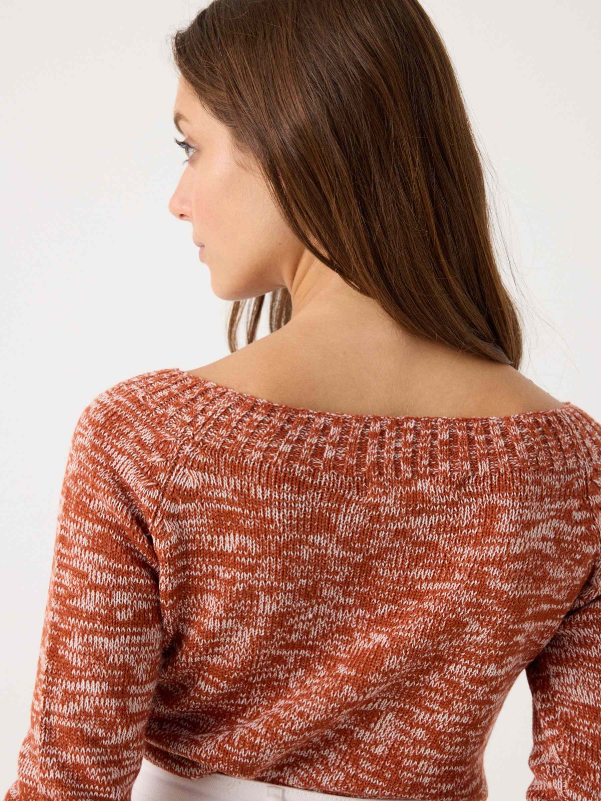 Marbled boat sweater orange detail view