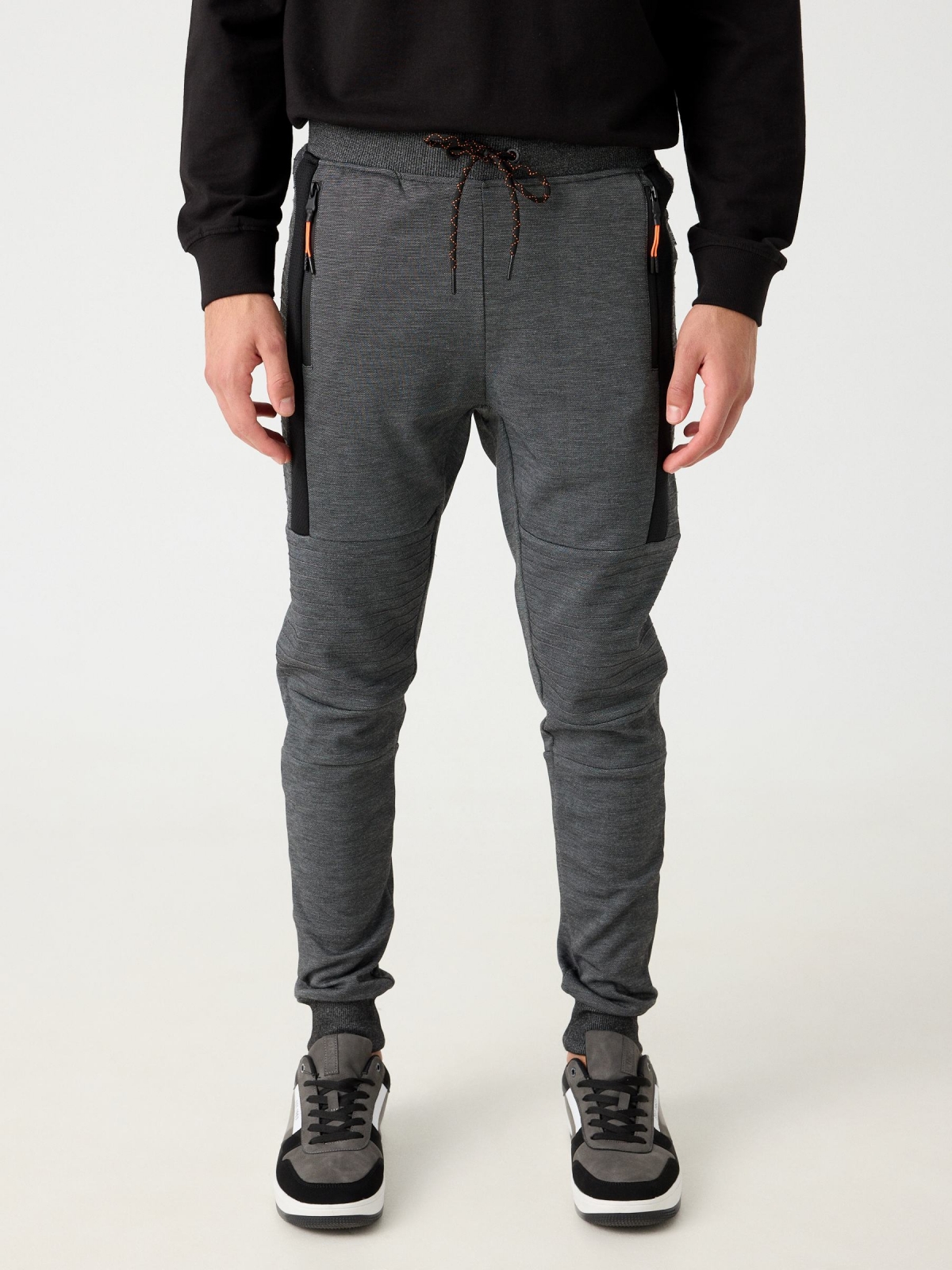 Jogger pants with zippers black middle front view