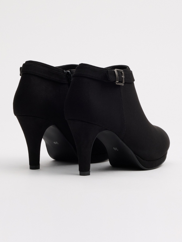 Black ankle boots with buckle and heel black 45º back view