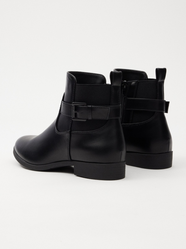 Elastic and buckle ankle boots black 45º back view