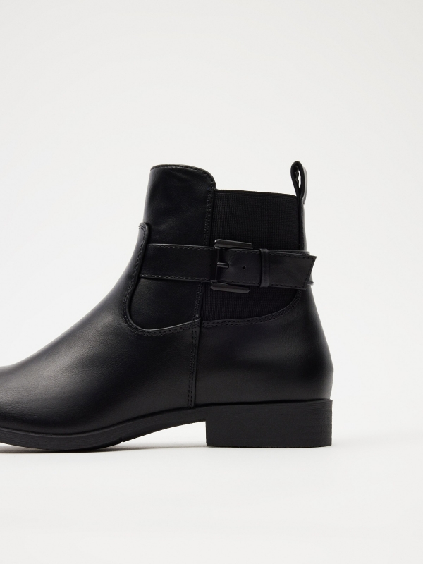 Elastic and buckle ankle boots black detail view