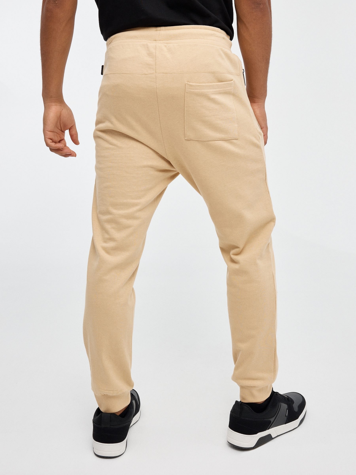 Jogger pants with pockets sand middle back view