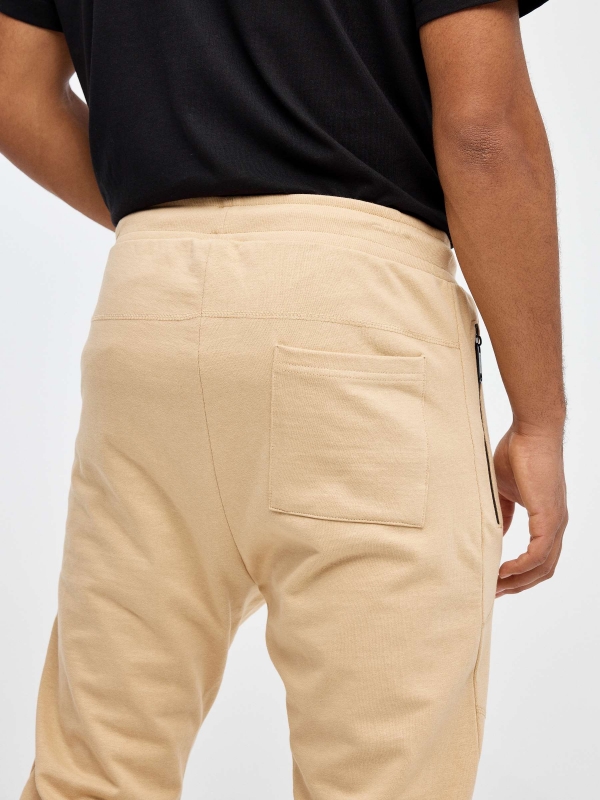 Jogger pants with pockets sand detail view
