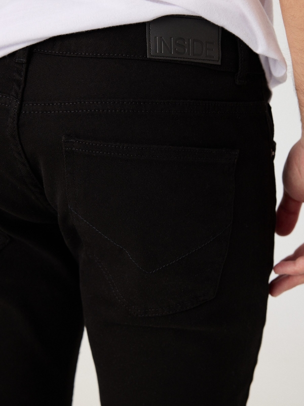 Regular five-pocket trousers black detail view