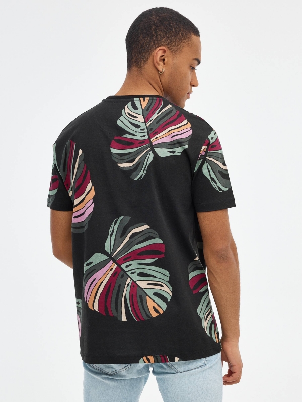 T-shirt de folhas multicoloridas preto vista meia traseira