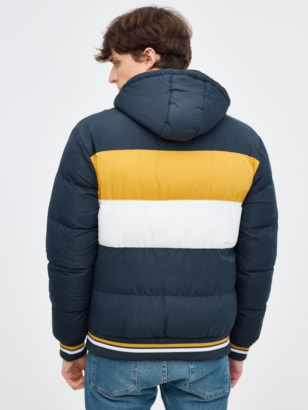 Nylon block color jacket with hood blue middle back view