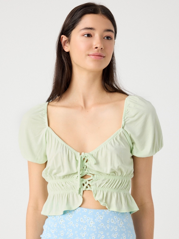 Lace up ruffle cropped t-shirt light green middle front view