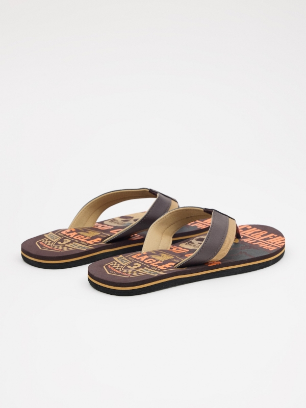 Patent leather thong sandal earth brown 45º back view