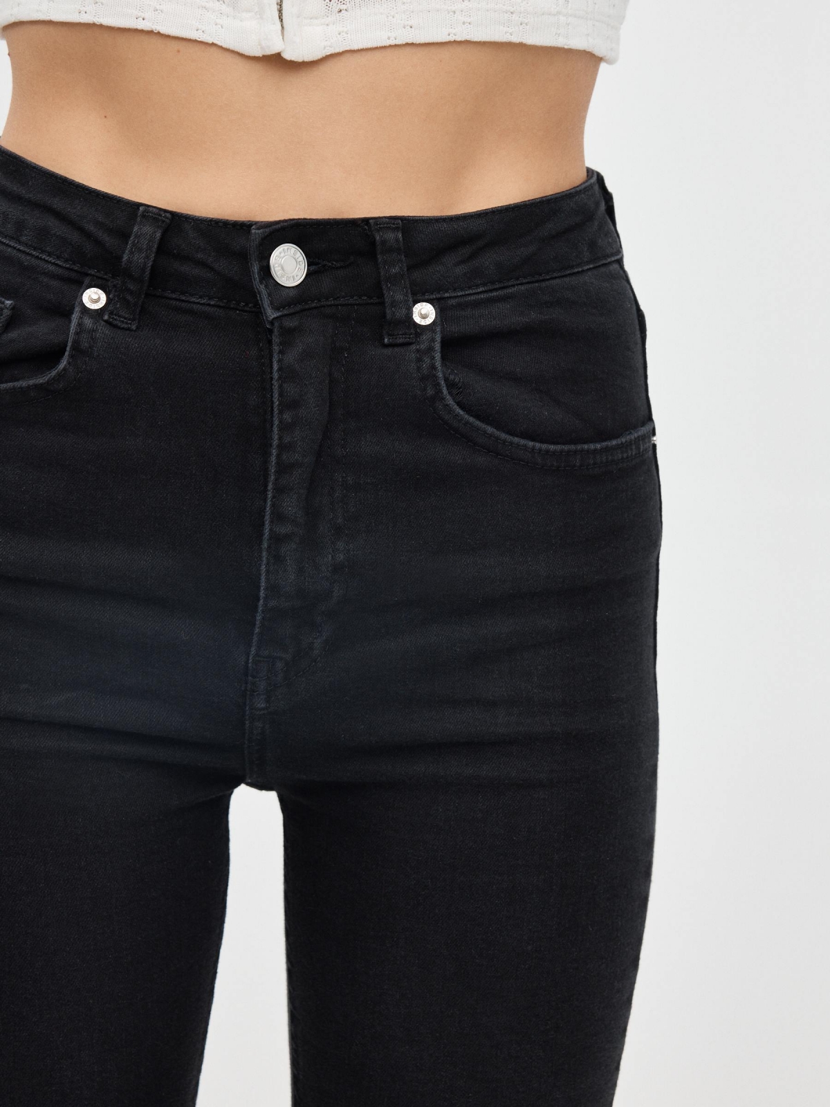 High rise skinny jeans black detail view