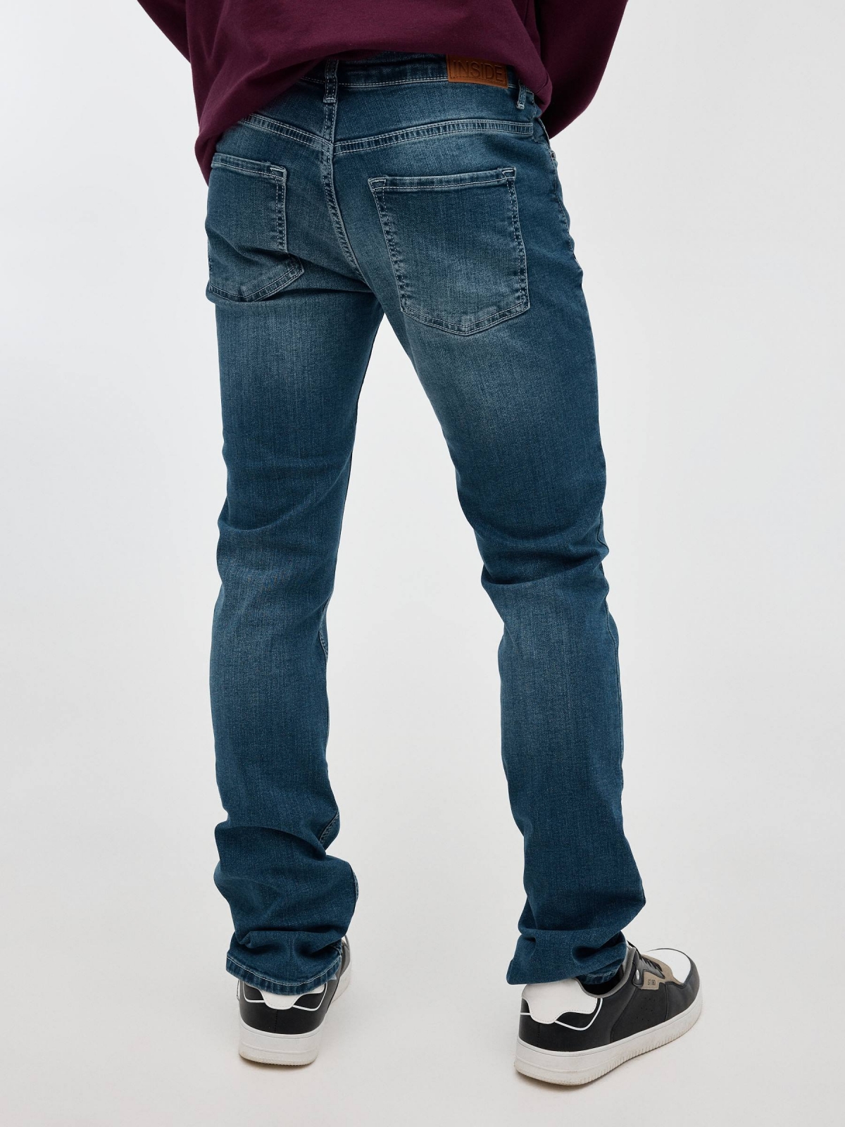 Dark blue regulation jeans blue middle back view