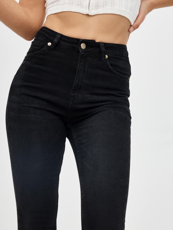 High rise skinny jeans black detail view