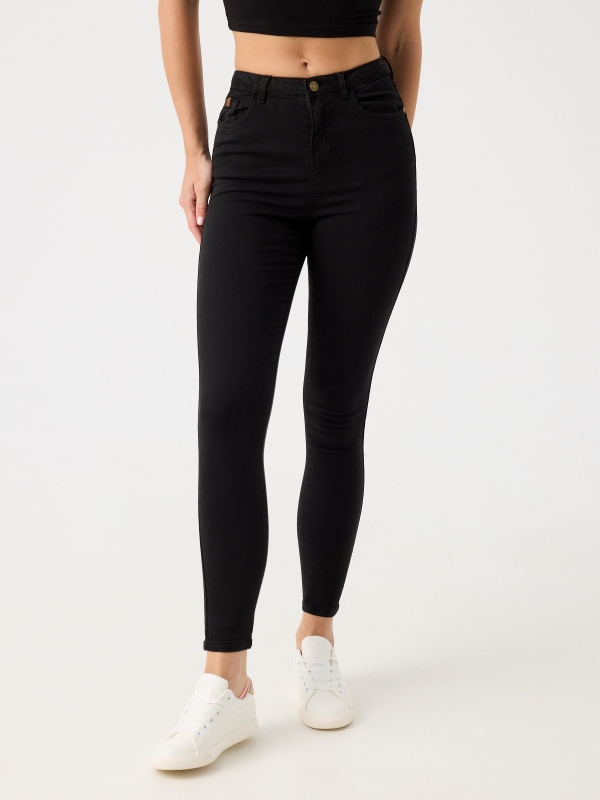 High rise skinny pants black middle front view