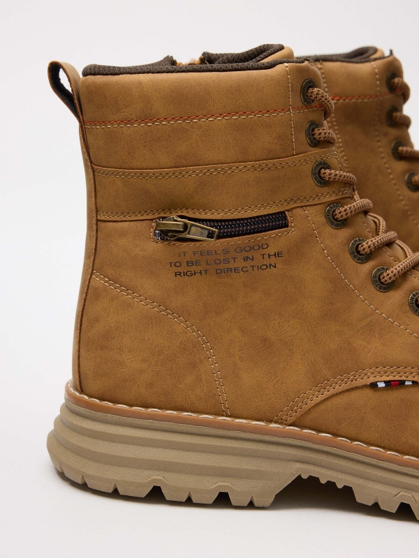 Mountaineering boot with zipper yellow detail view