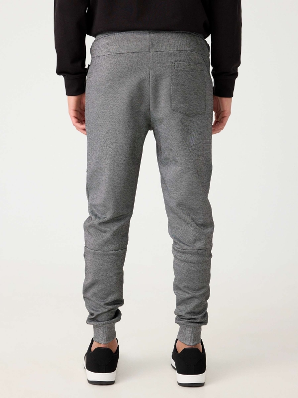 Jogger pants with zippers grey middle back view
