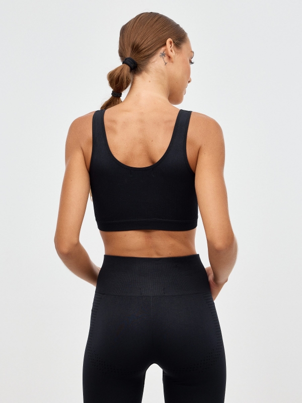Seamless ribbed top black middle back view