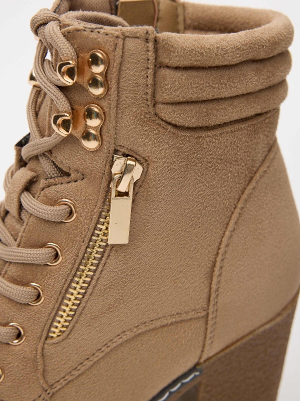 Ankle boots with collar and zipper detail view