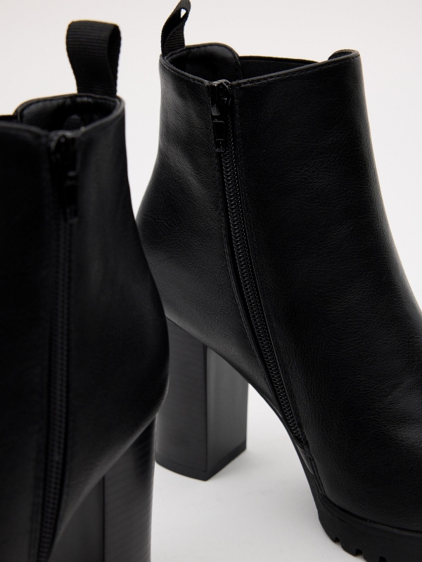 Rubber heeled ankle boots black detail view