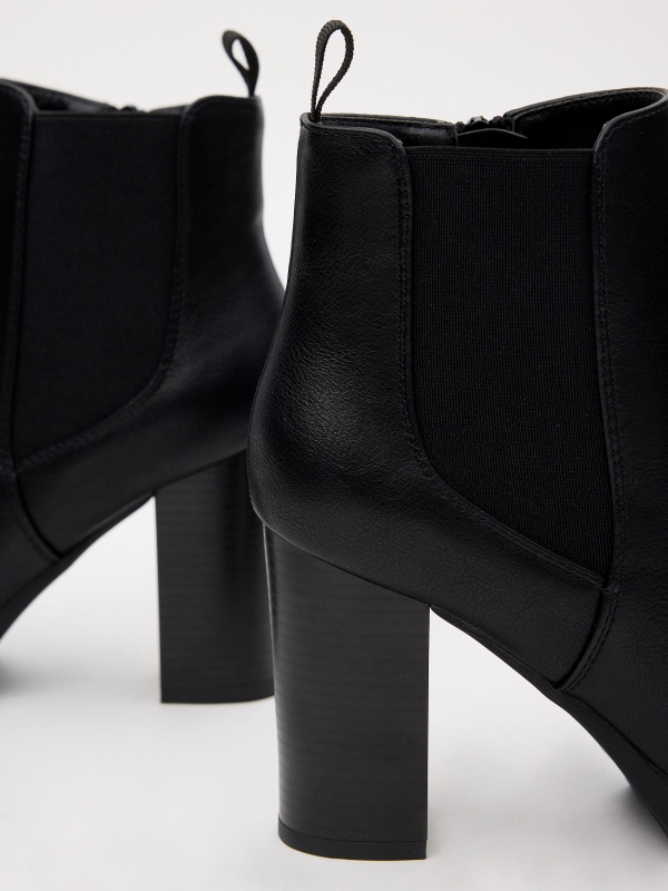 Rubber heeled ankle boots black detail view