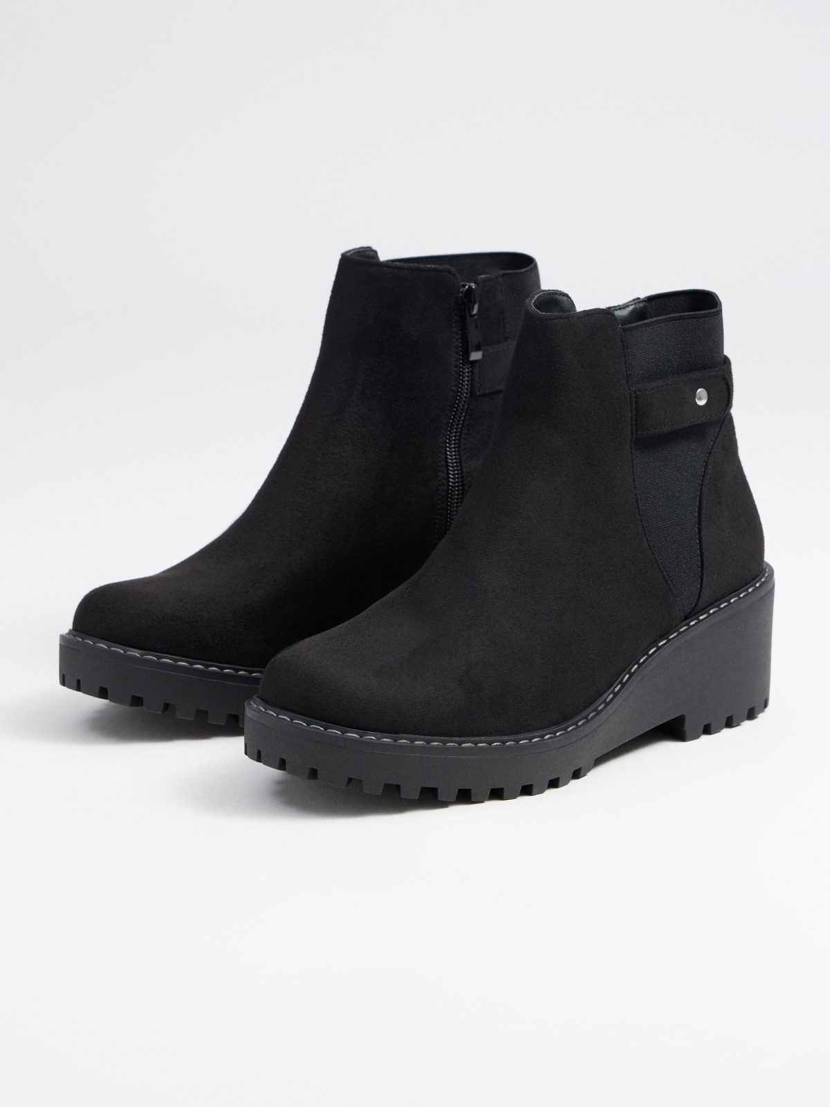 Wedge and buckle boots 45º front view