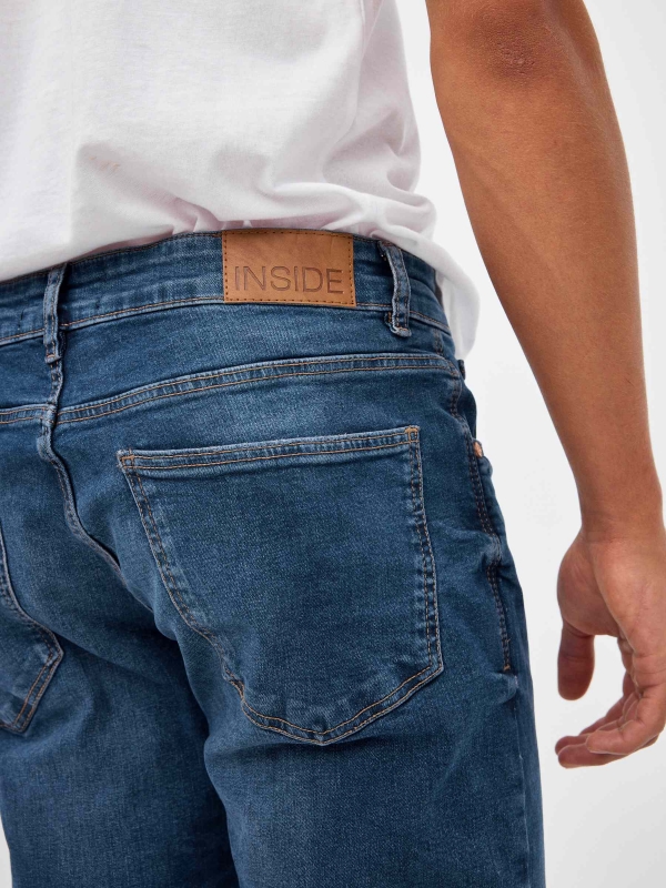 Mid rise slim denim jeans blue detail view