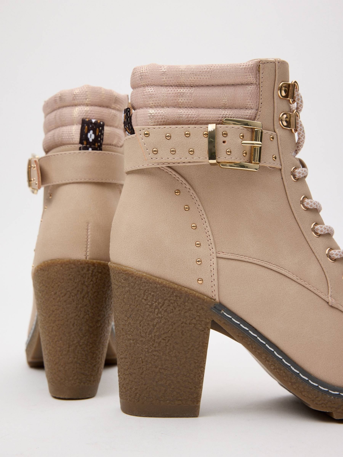 Ankle boots with heel and buckle with collar detail view