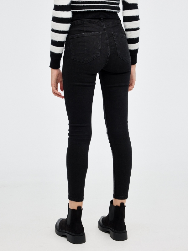 Black push up skinny jeans black middle front view