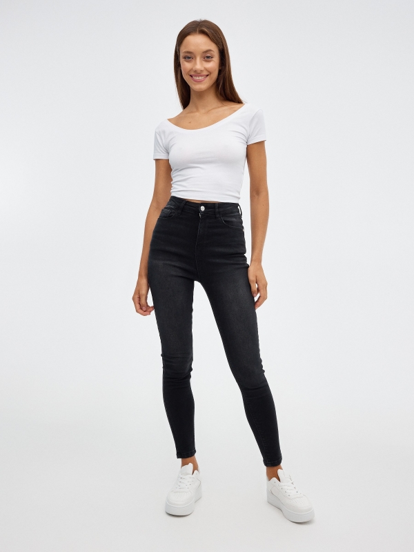Black high rise skinny jeans black front view