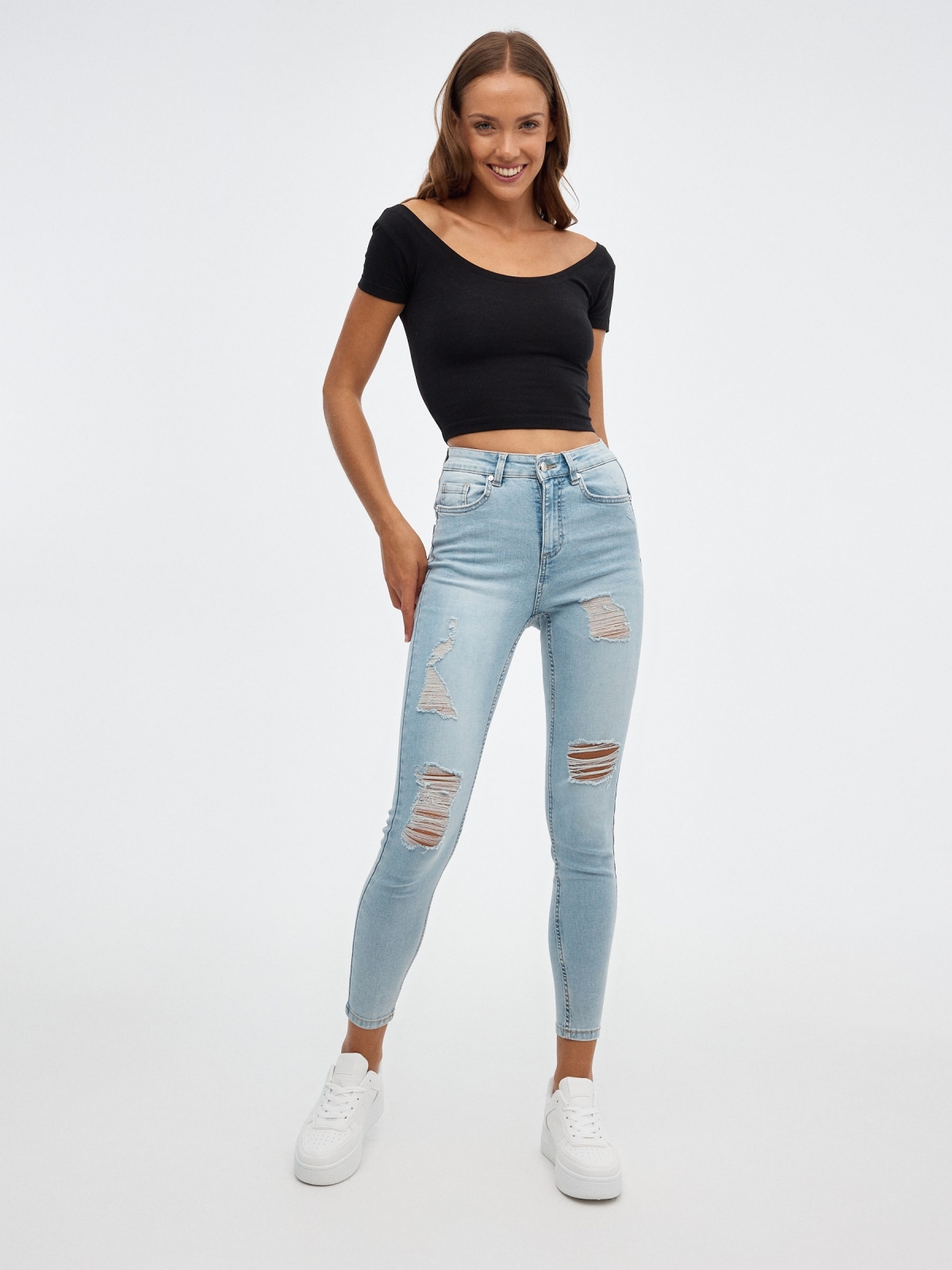Skinny jeans mid rise push up light blue front view