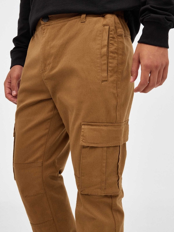 Jogger pants with pocket legs beige detail view