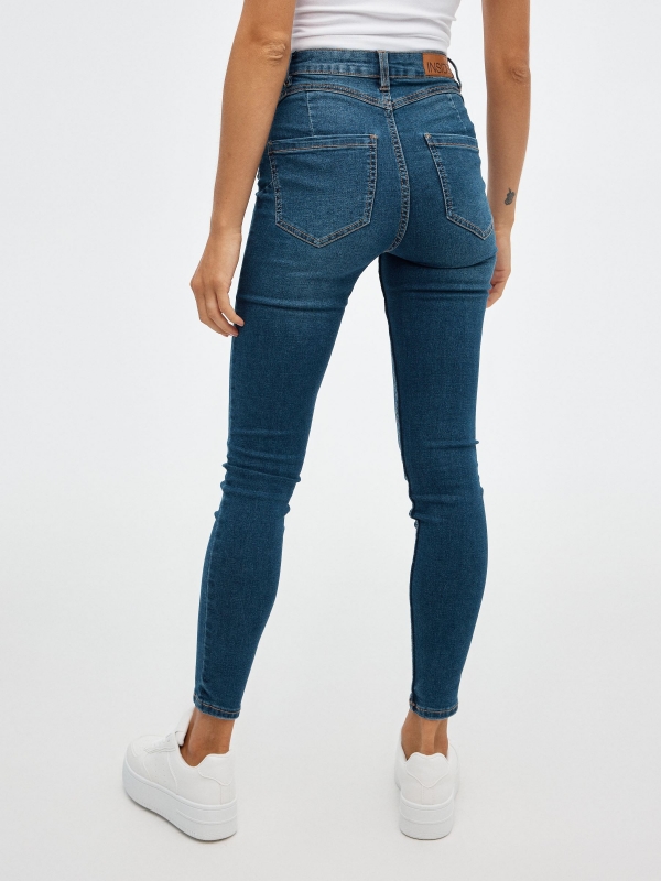 Skinny jeans with push up blue middle back view