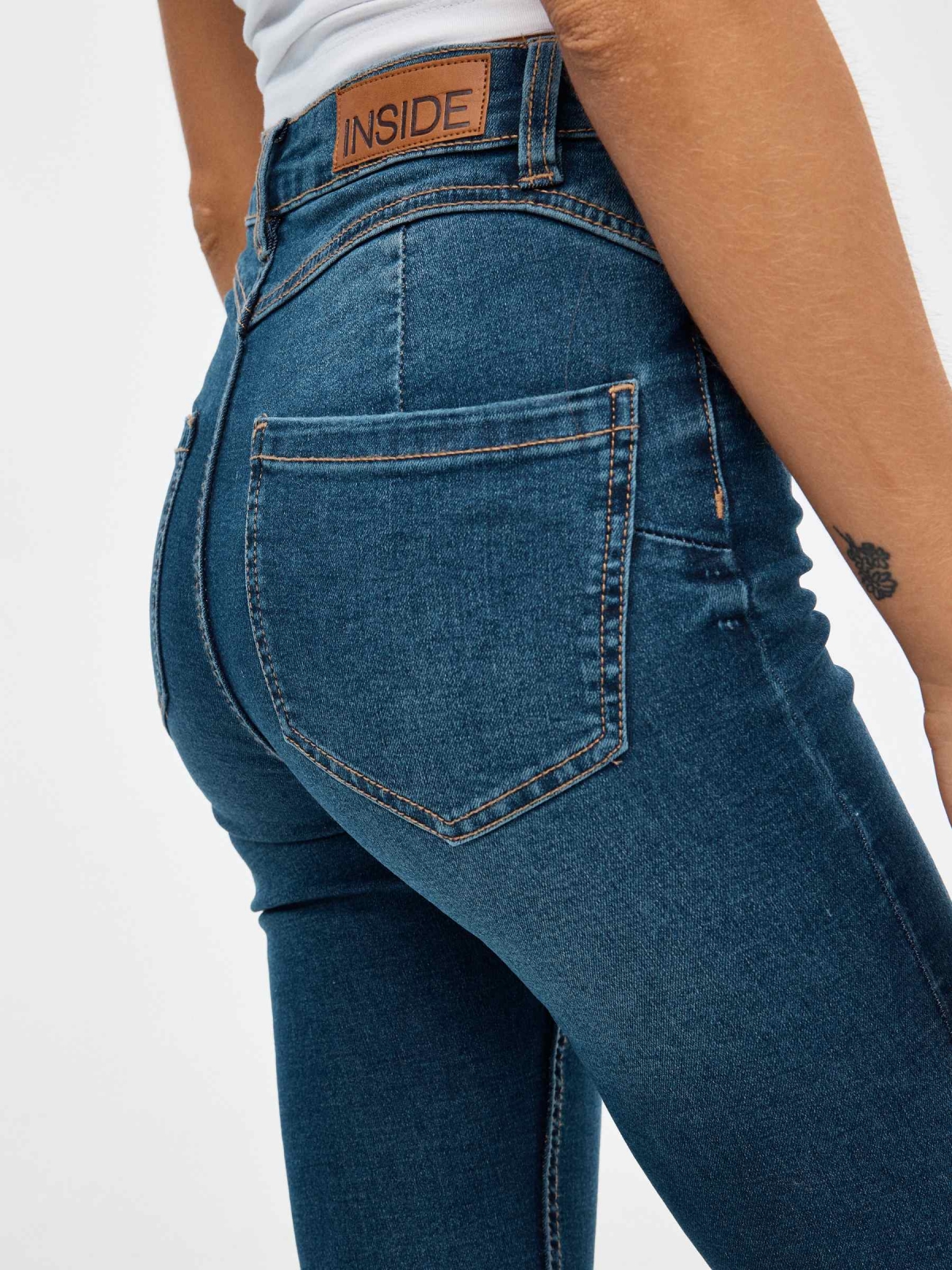 Skinny jeans with push up blue detail view