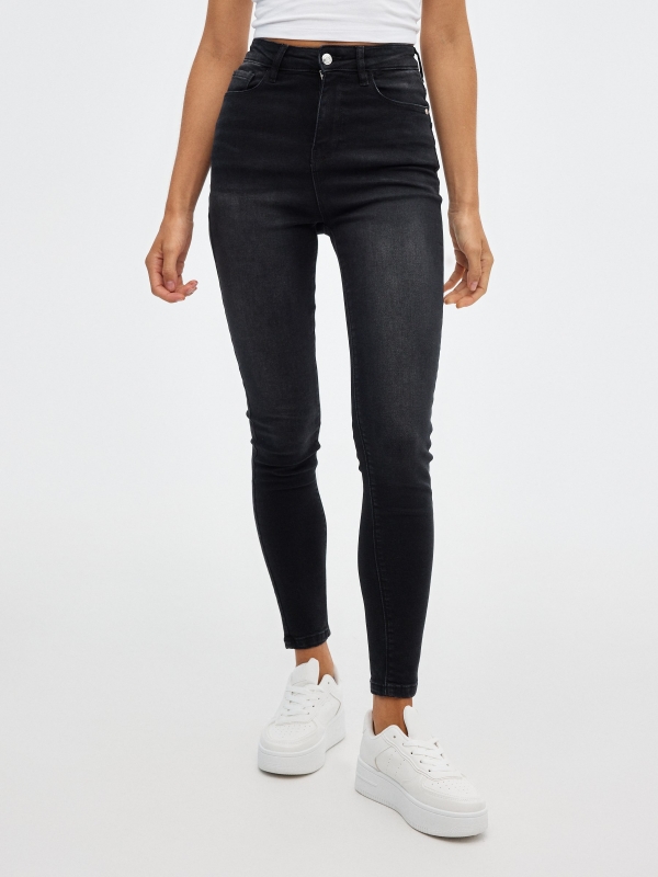 Black high rise skinny jeans black middle front view