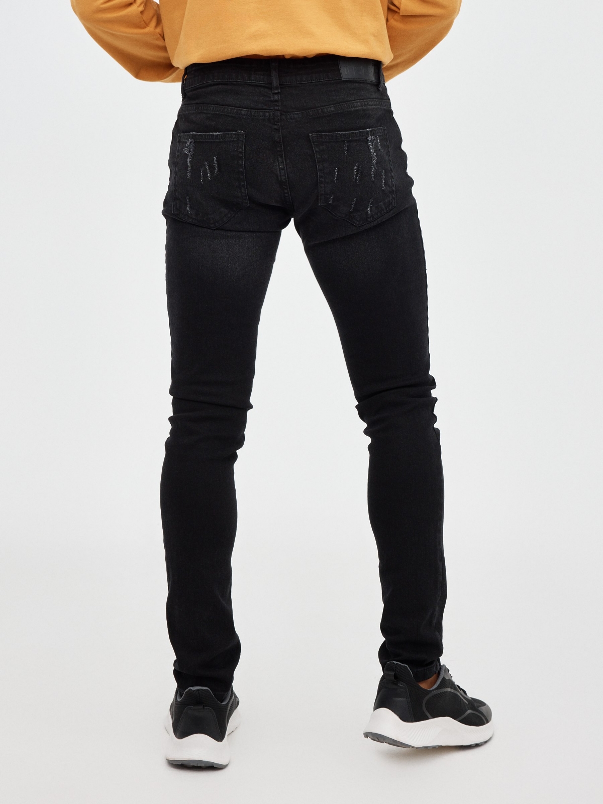 Super slim basic jeans black middle back view