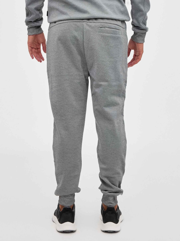 Textured jogger pants light grey middle back view