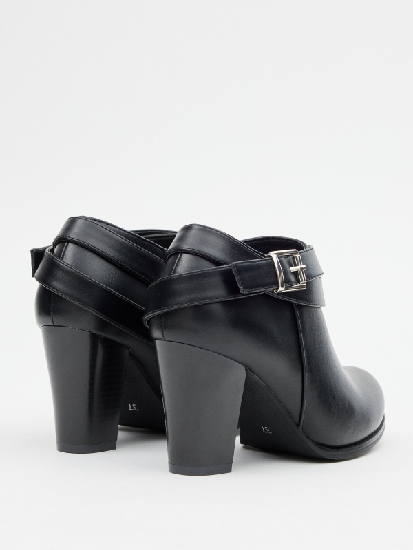 Patent leather ankle boots with buckle black 45º back view