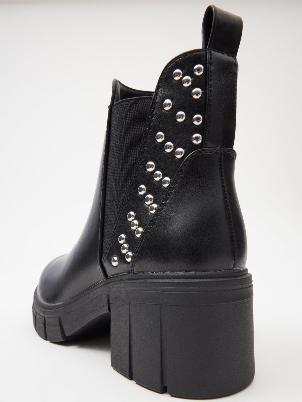 Ankle boots with elastic and studs black detail view