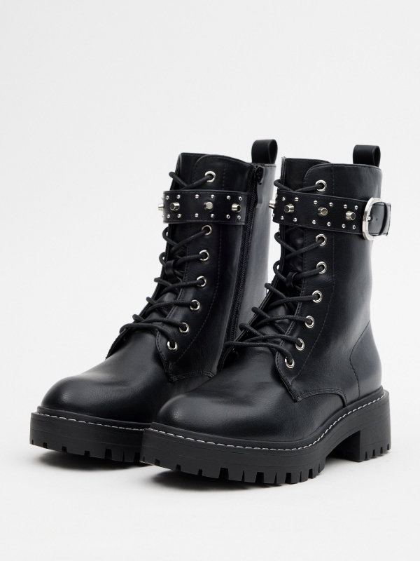Lace-up boots with buckle and studs black 45º front view