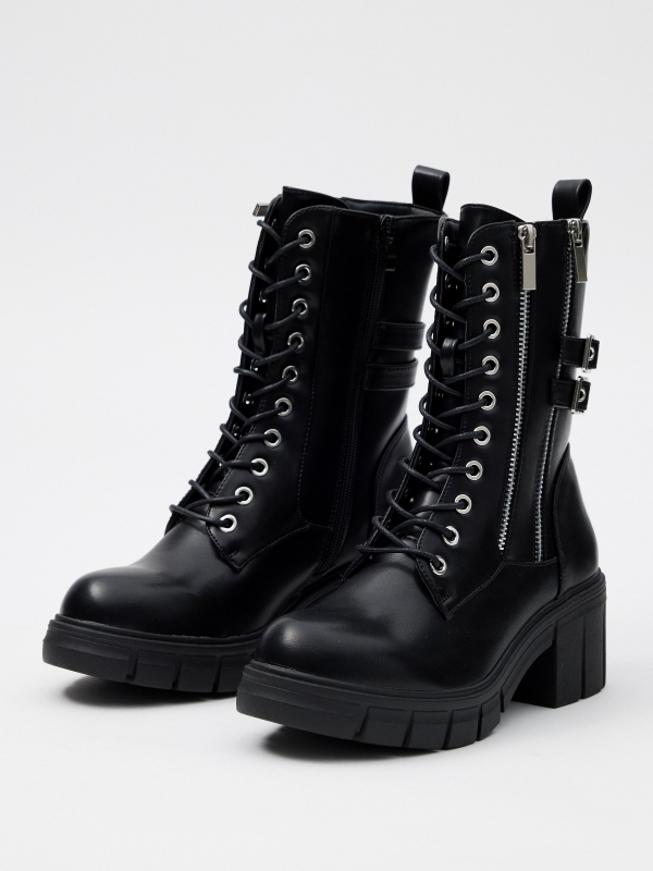Ankle boots with studs and buckles black 45º front view