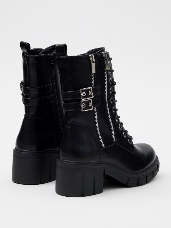 Ankle boots with studs and buckles black 45º back view