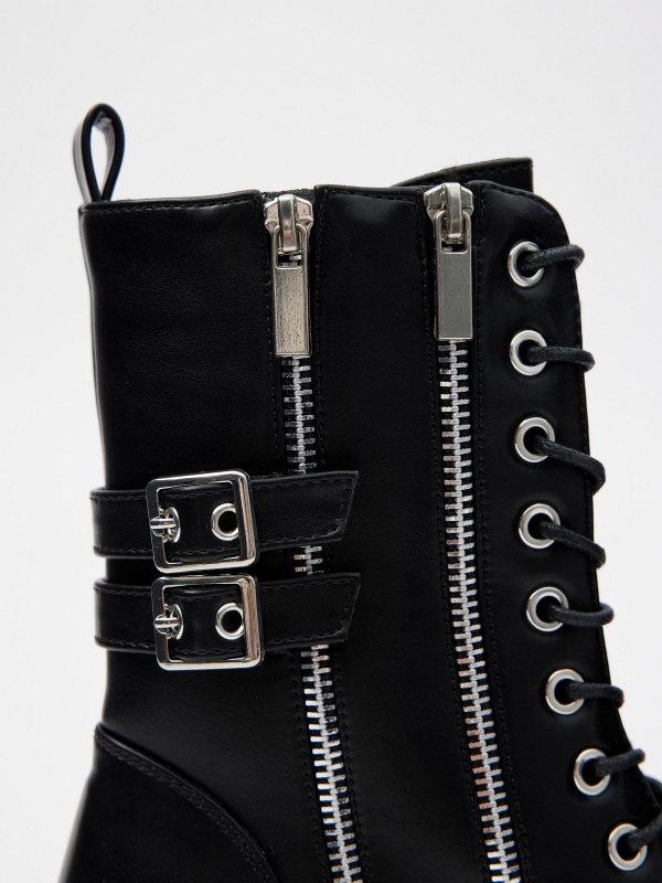 Ankle boots with studs and buckles black detail view