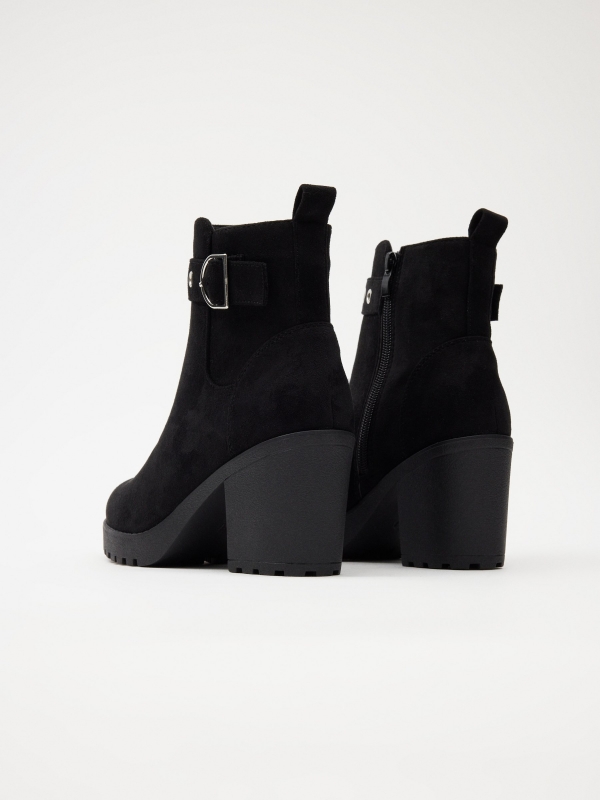 Ankle boot with buckle and wide heel black detail view